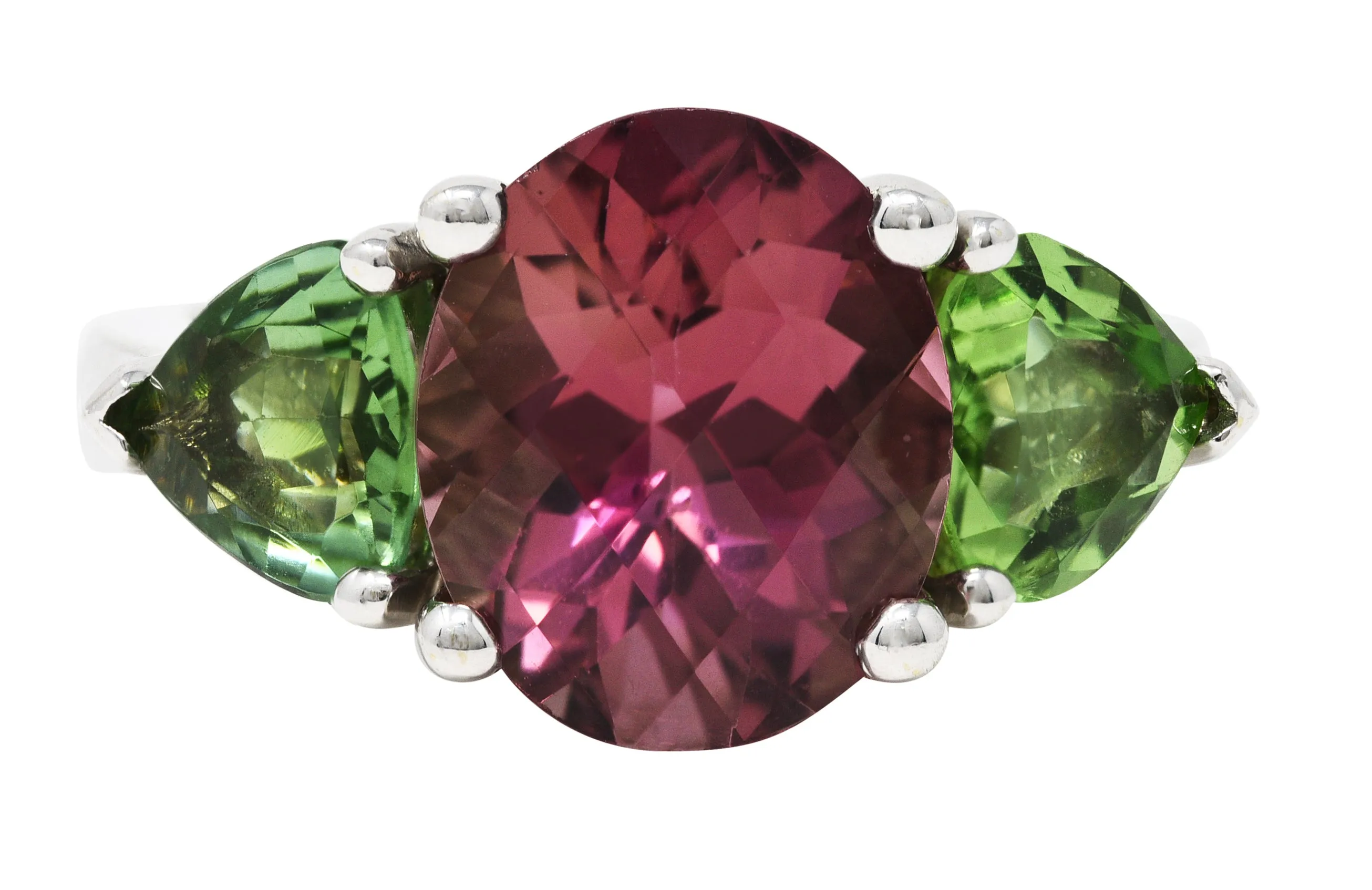 Contemporary 7.23 CTW Oval Cut Pink Tourmaline Peridot 18 Karat White Gold Three Stone Ring