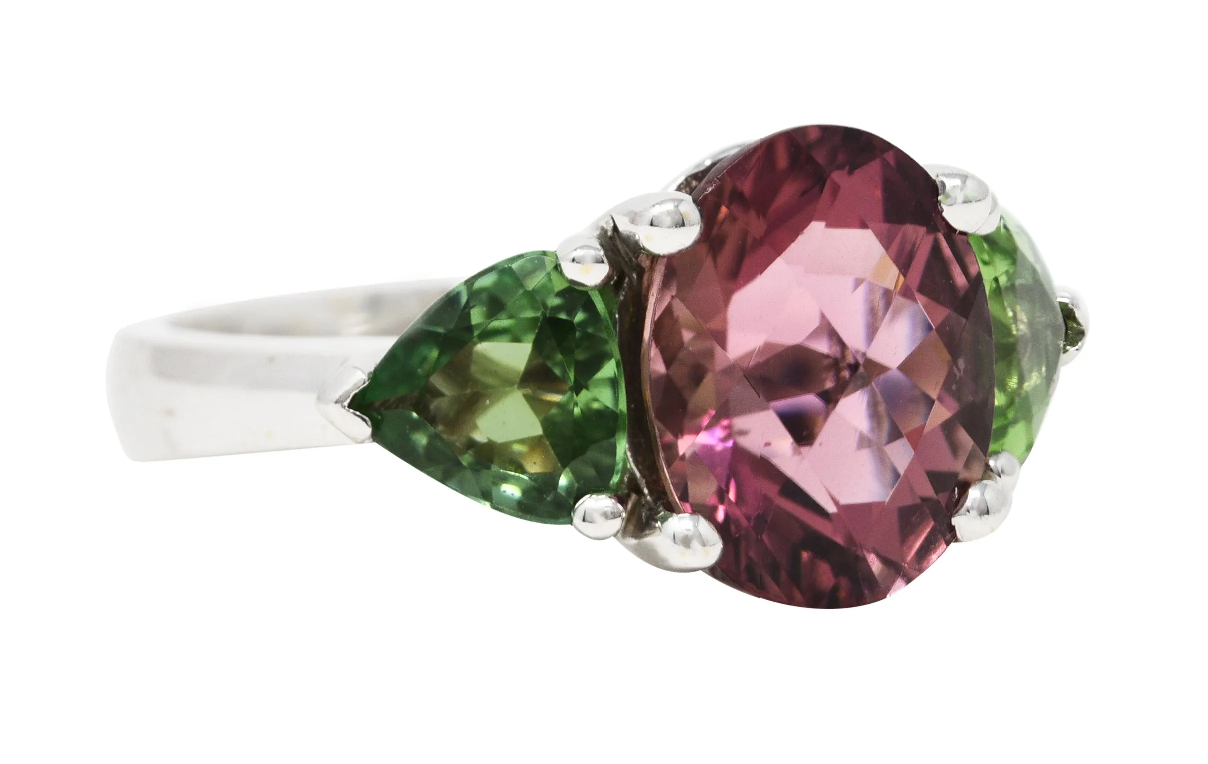 Contemporary 7.23 CTW Oval Cut Pink Tourmaline Peridot 18 Karat White Gold Three Stone Ring