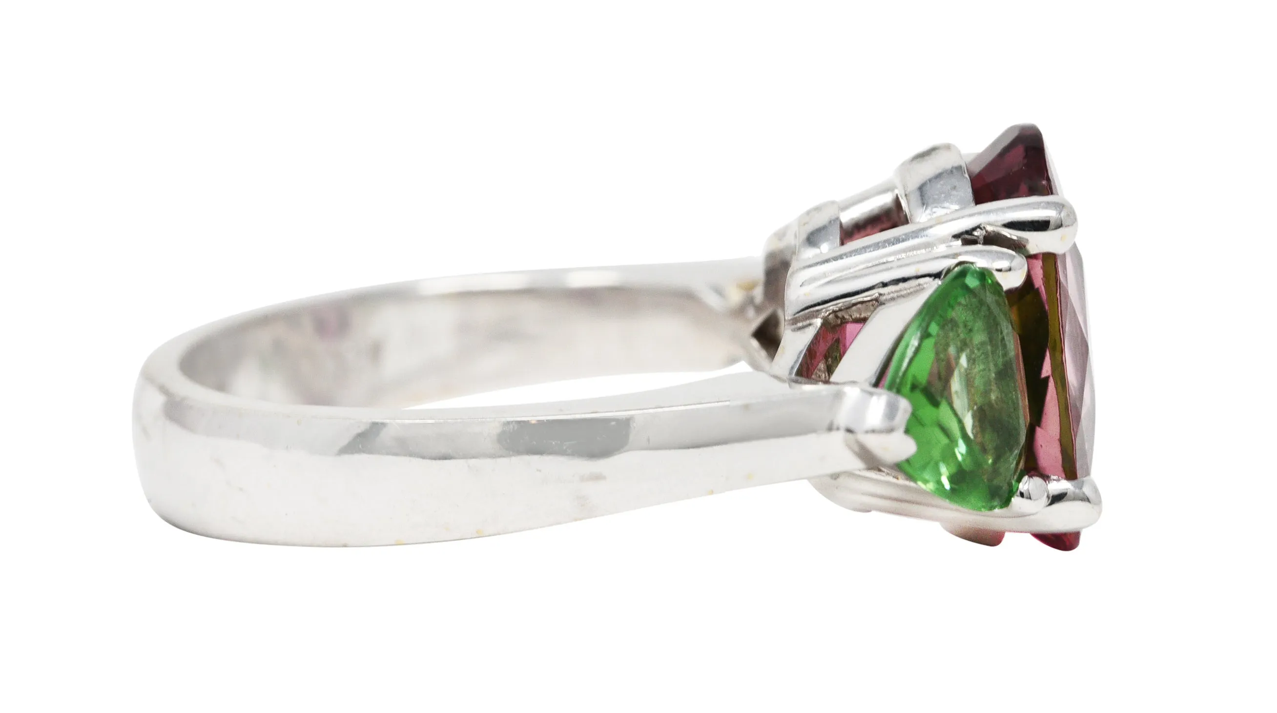 Contemporary 7.23 CTW Oval Cut Pink Tourmaline Peridot 18 Karat White Gold Three Stone Ring