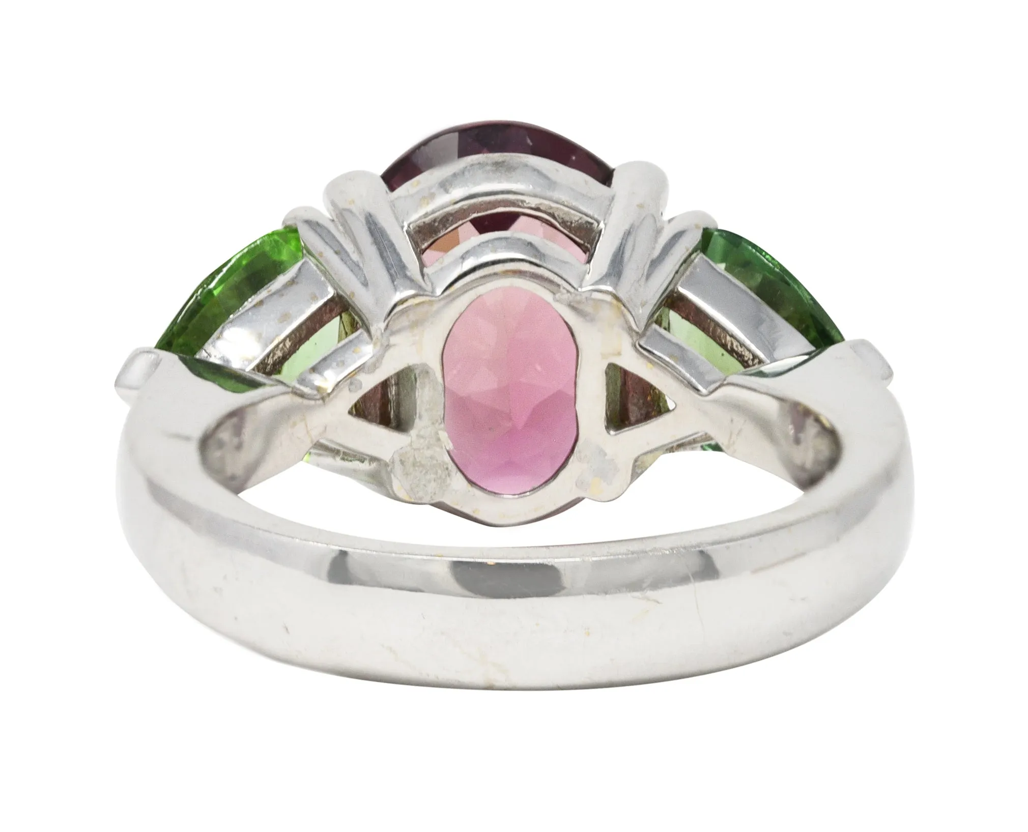 Contemporary 7.23 CTW Oval Cut Pink Tourmaline Peridot 18 Karat White Gold Three Stone Ring