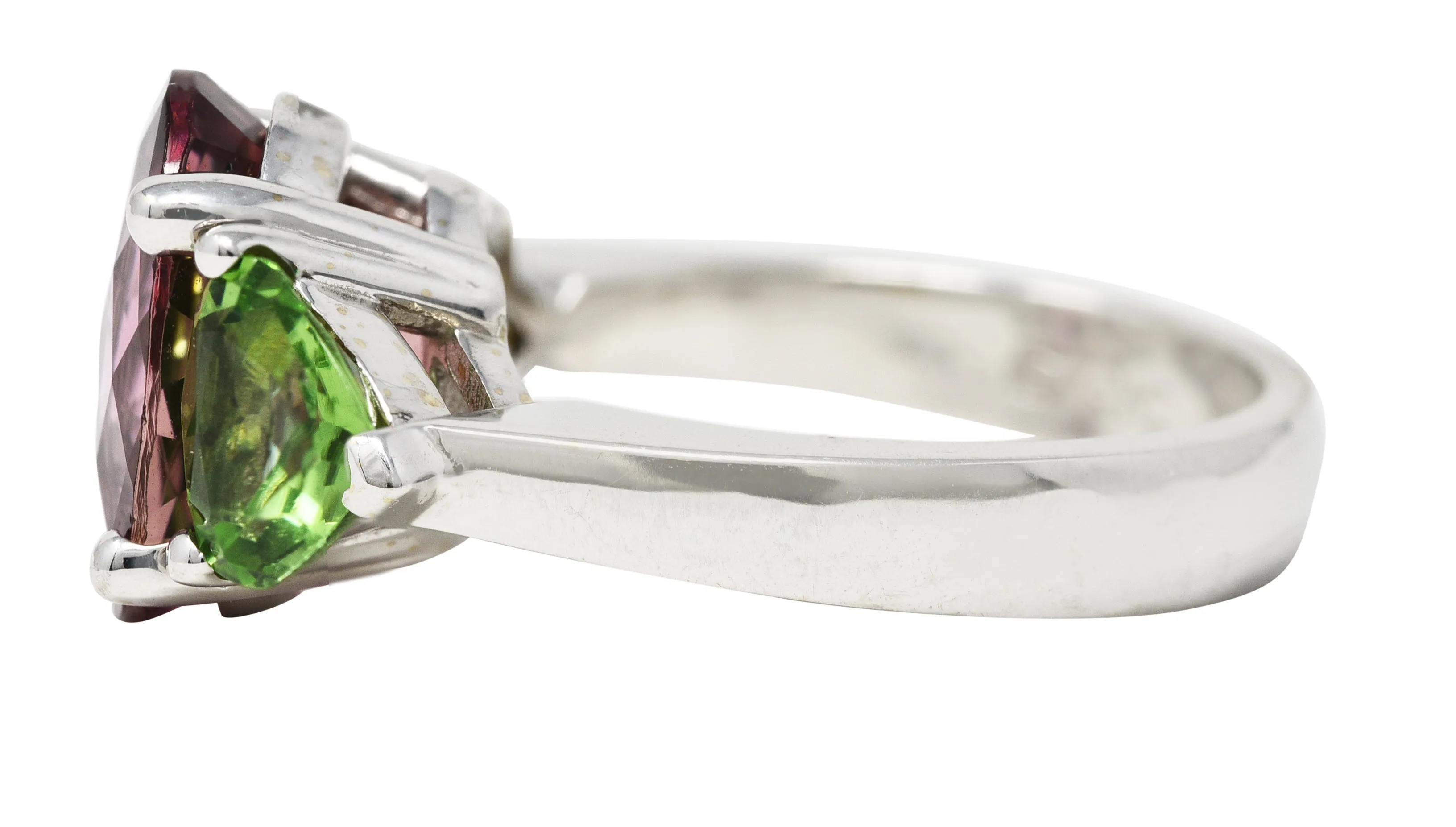 Contemporary 7.23 CTW Oval Cut Pink Tourmaline Peridot 18 Karat White Gold Three Stone Ring