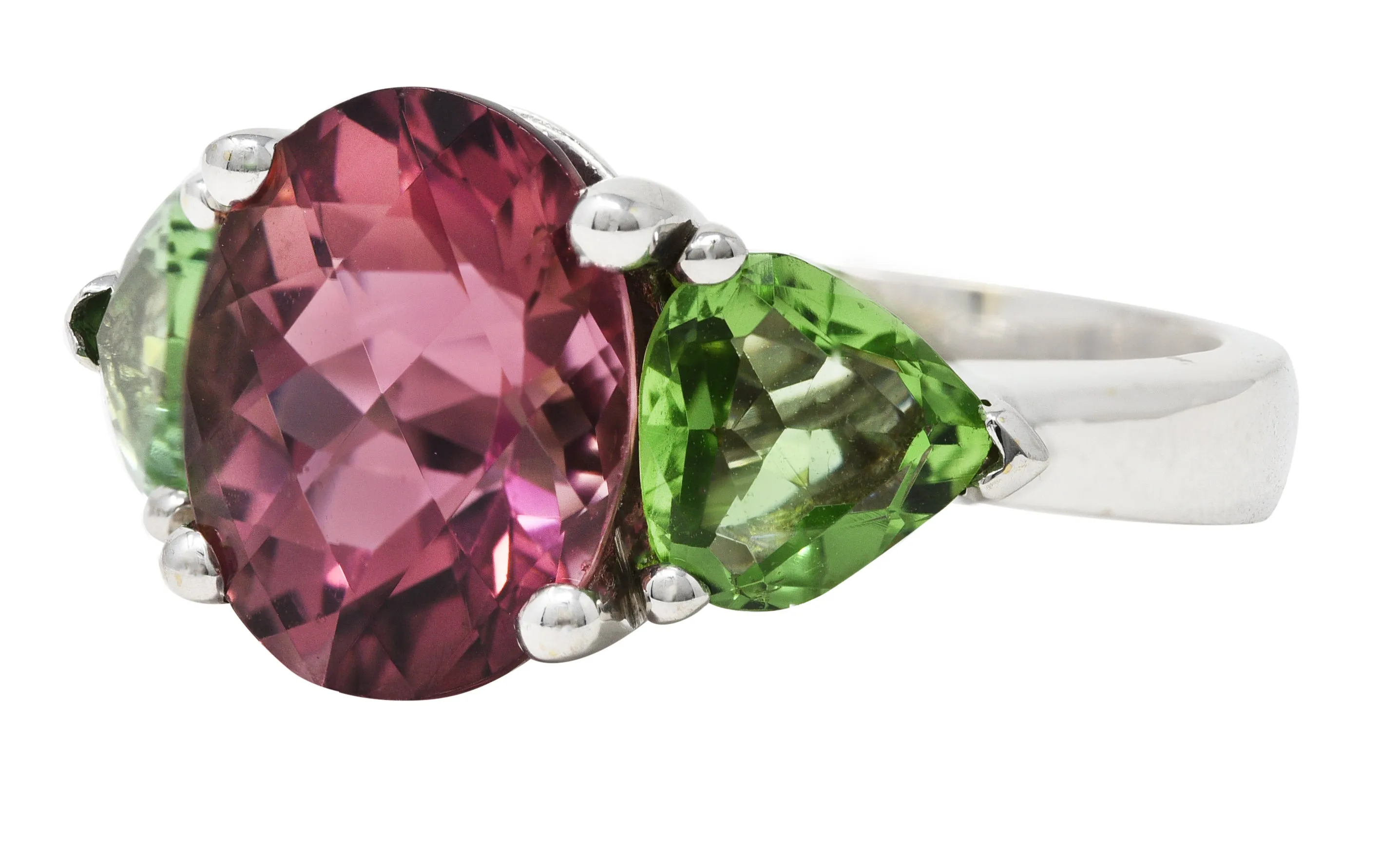 Contemporary 7.23 CTW Oval Cut Pink Tourmaline Peridot 18 Karat White Gold Three Stone Ring