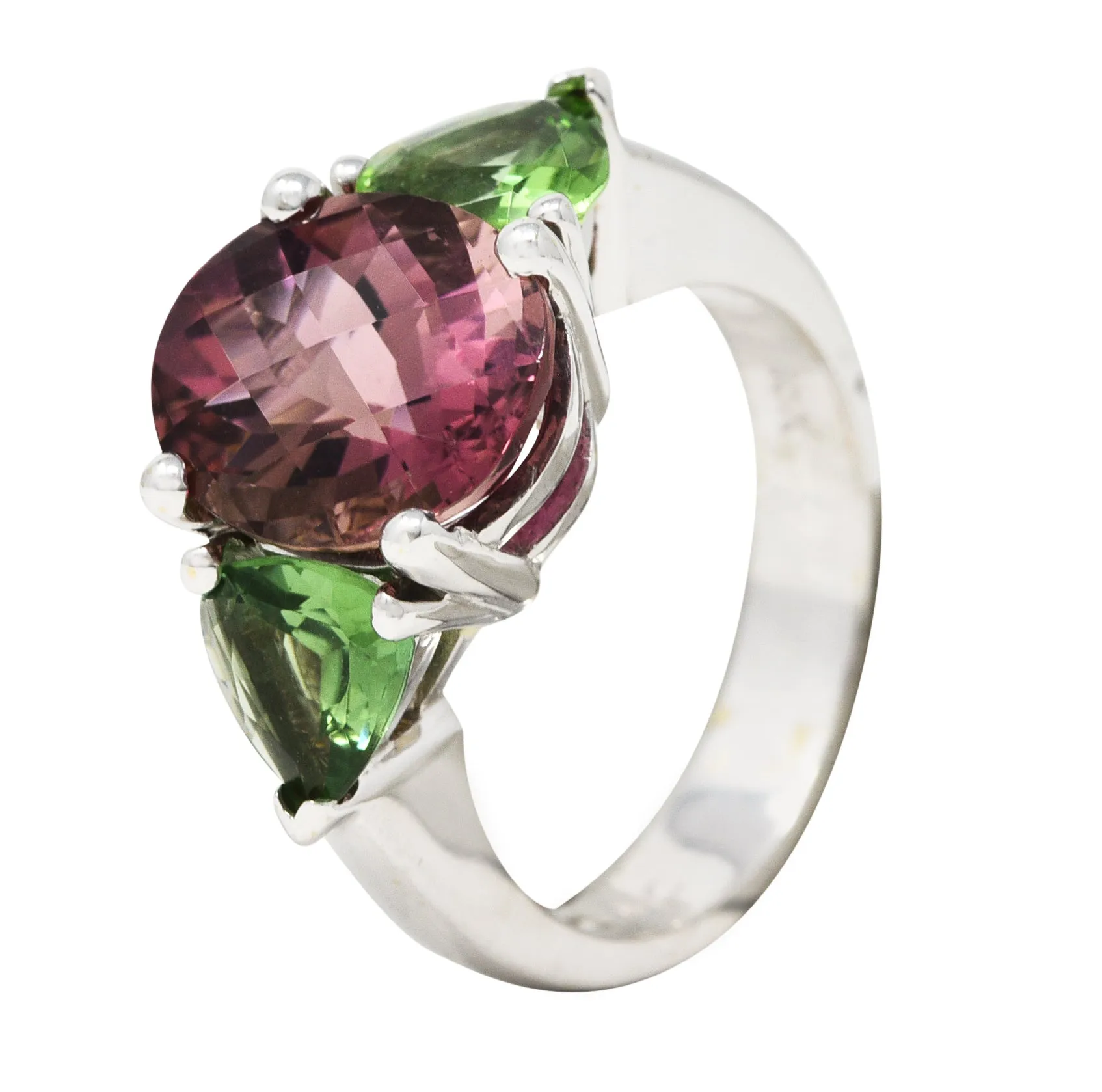 Contemporary 7.23 CTW Oval Cut Pink Tourmaline Peridot 18 Karat White Gold Three Stone Ring